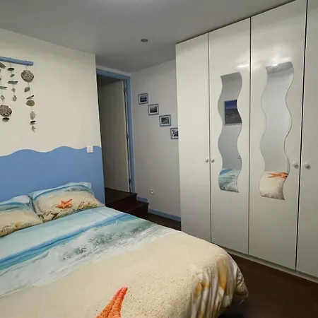 Bord De Les Pieds Dans L'eau 格里莫